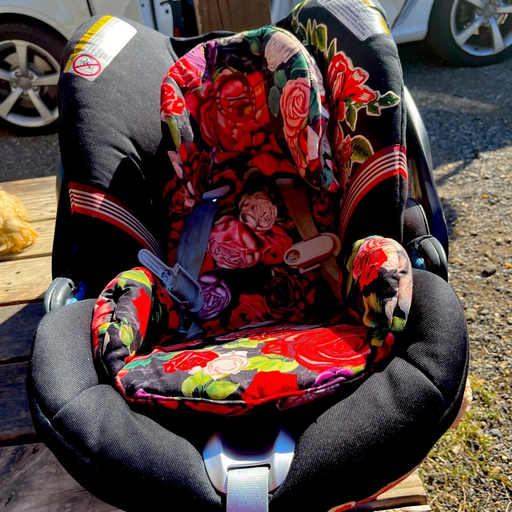 Pretty Cybex infant car seat. Barely used. Comes with base as well